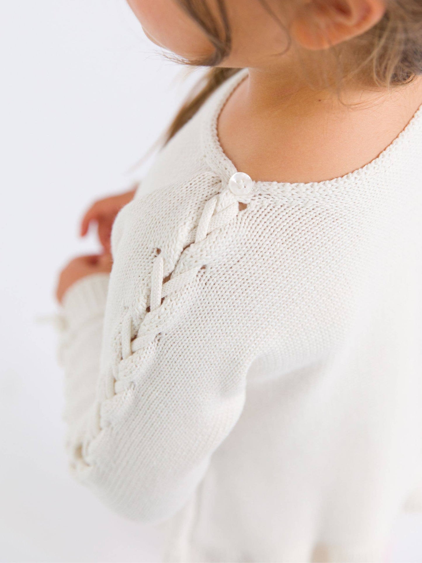 Girls Ivory Ruffle Hem Lace Up Sweater: Off-White