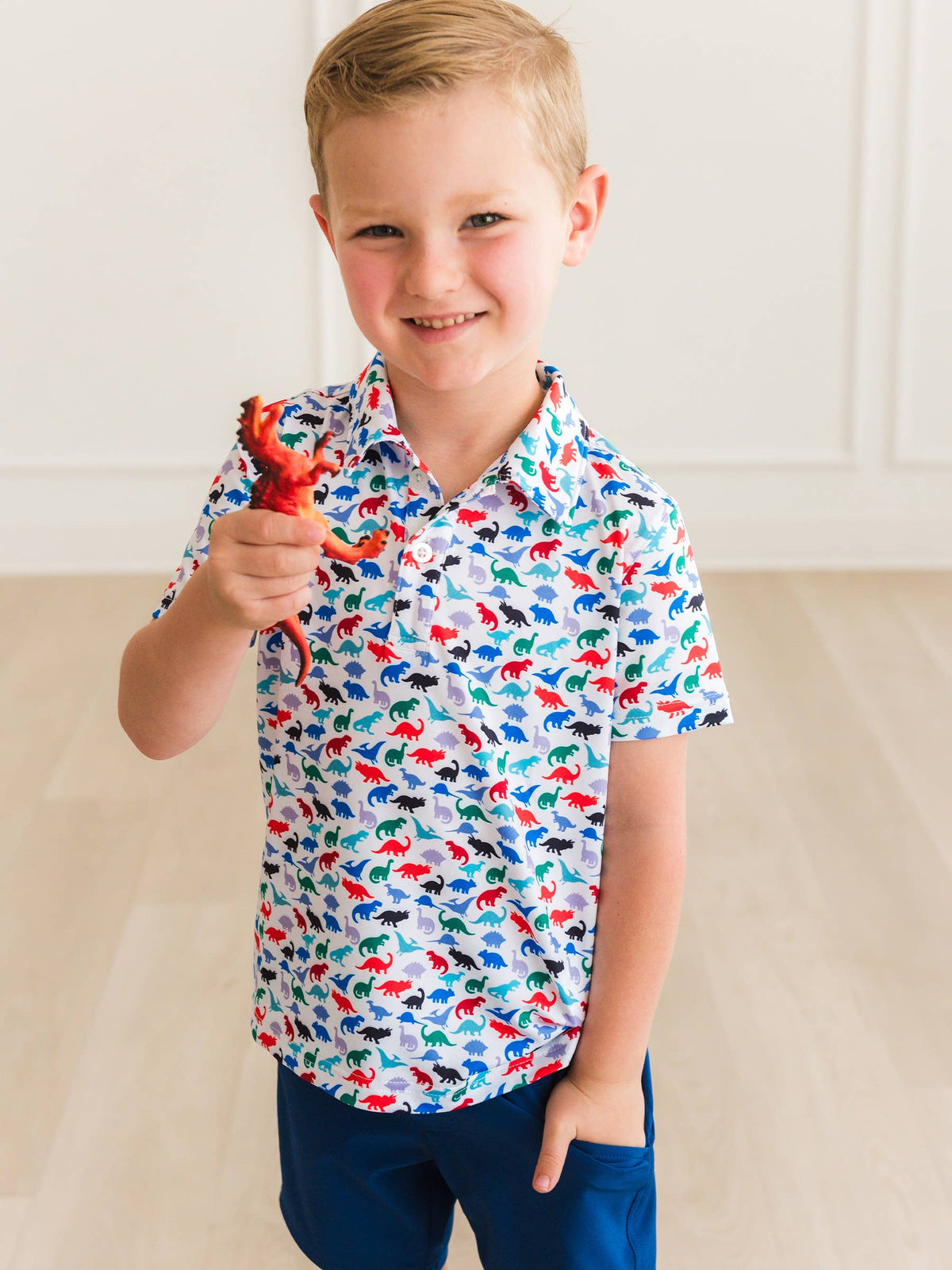 Boys Dino Roar Knit Short Sleeve Performance Polo: Navy