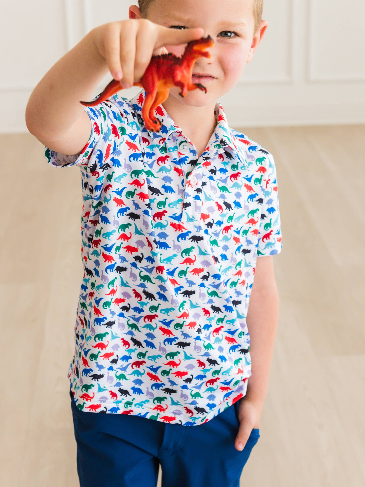 Boys Dino Roar Knit Short Sleeve Performance Polo: Navy